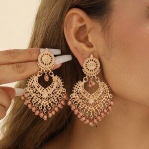 Bohemian style dusky pink and gold dangle earrings elegant opulent detailed